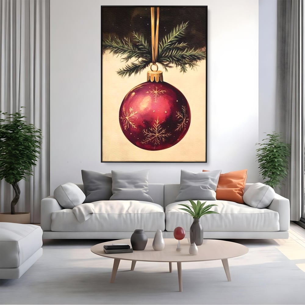 Tablou canvas cu tablou canvas cu glob de craciun visiniu, in rama de aluminiu negru, pe perete intr-un living